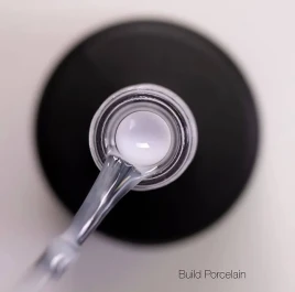 LUXIO Build PORCELAIN 15мл Гель для укрепления камуфлирующий молочный