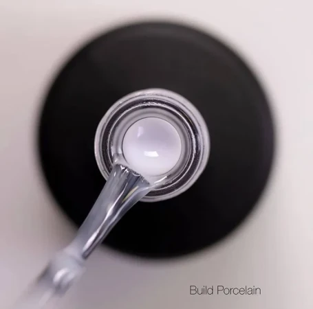 LUXIO   Build PORCELAIN   15мл    Гель для укрепления камуфлирующий молочный